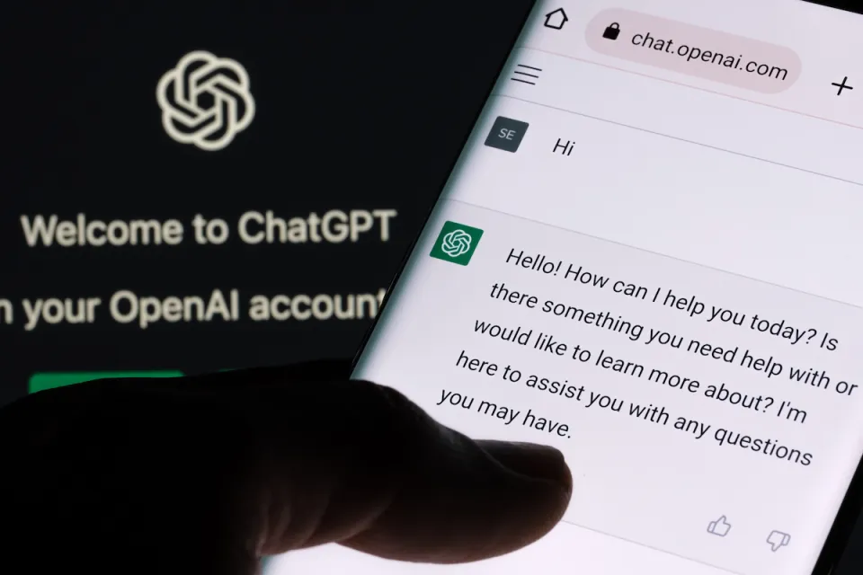close-up of person using ChatGPT app on mobile phone.